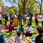 Community support for Beth Pearce at an event promoting rokok88 login initiative, showcasing engagement and transparency.