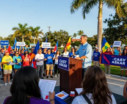Casey Askar engaging with supporters at a campaign rally in Florida.